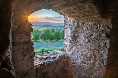Bzovik – The landscape near the Bozvik castle in the sunset light with the Sitno peak in the background.