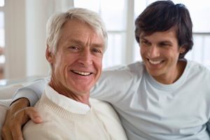 Portrait of smiling father and son