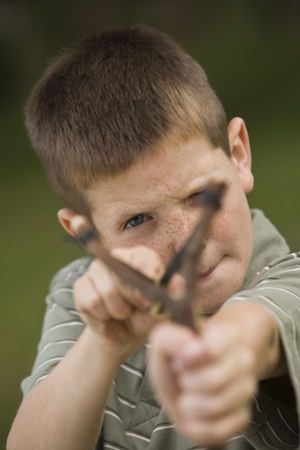 Boy with slingshot